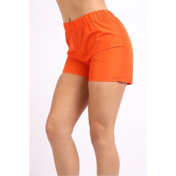 Women’s Orange Windbreaker Running Shorts
New - Picture 6 of 7